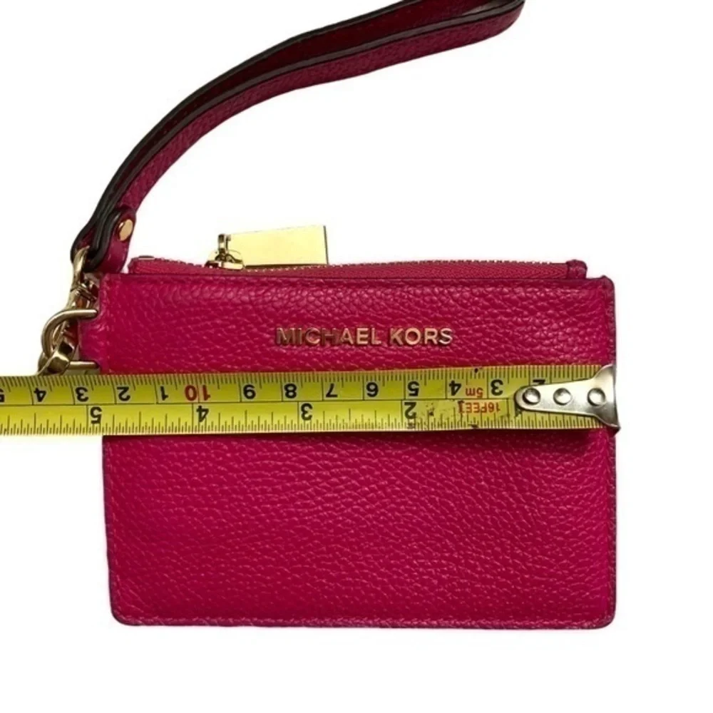 Michael Kors pink pebbled leather wristlet keyring bag